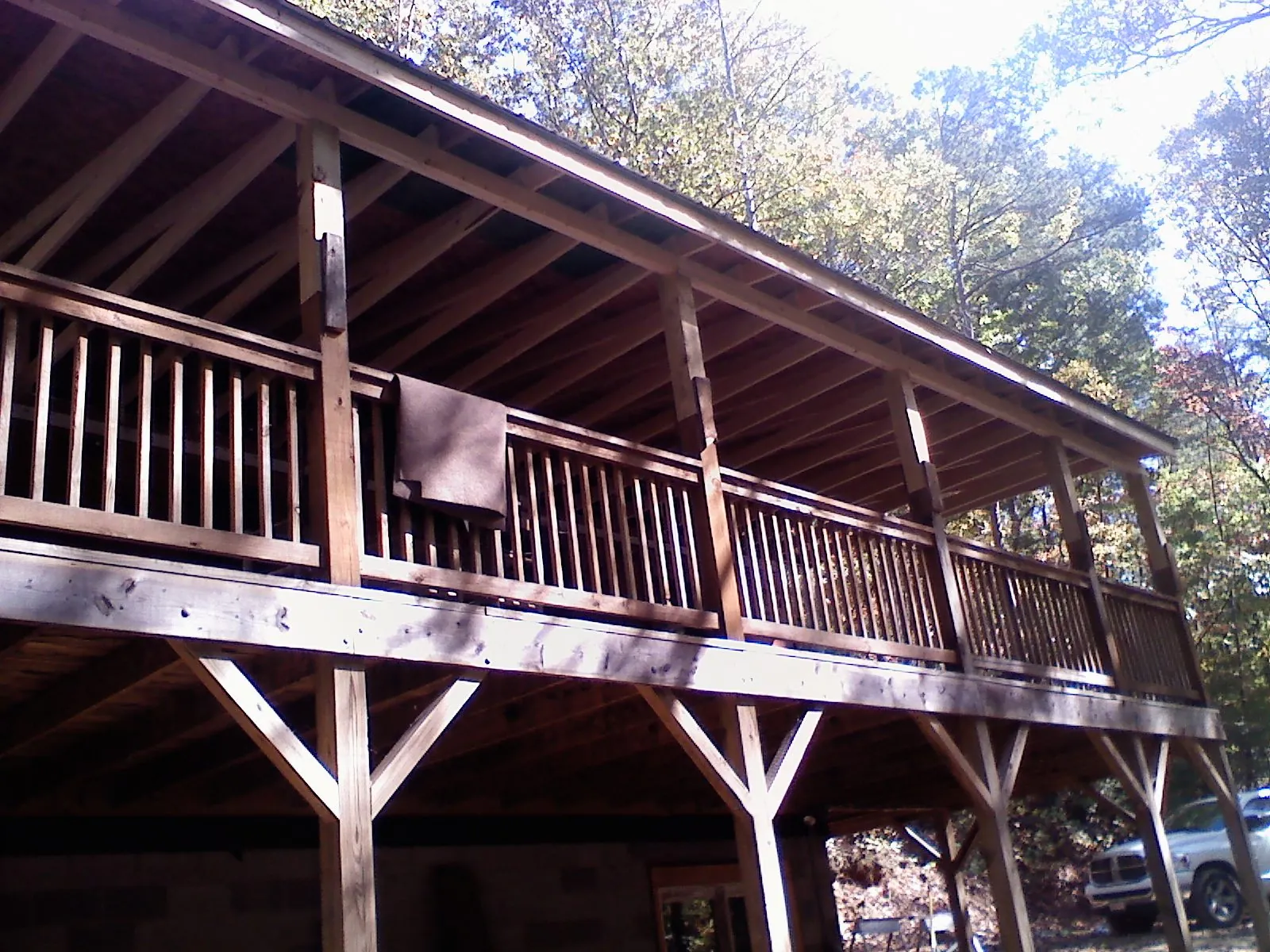 Timber framing under a new elevated porch and deck — Roof Leak Repair in Coffeyville by Roofing Brothers